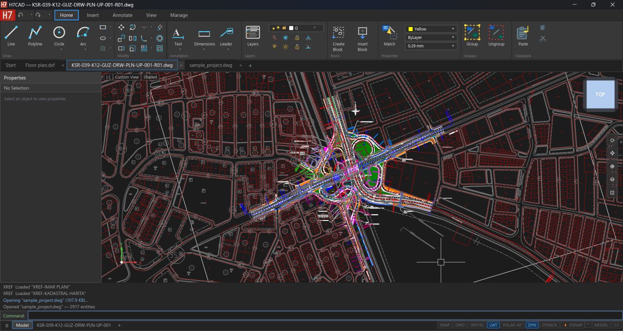 Open CAD Studio — donker thema CAD-applicatie met DWG-bestand van een complex stedelijk weg- en infrastructuur-ontwerp